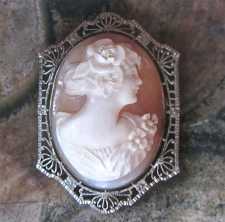 Detailed Art Deco carved Carnelian shell from the 1920th - 1930th White Gold filigree 10K Filigree Brooch. Signed by the Artist