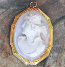 Outstanding High relief Coral carving Beauty Psyche-Goddess of Sex Marked 10K Yellow Gold Brooch/Pendant Circa 1900 - 1910.