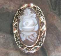 High relief Beautifully carved Detailed Rose, signed by the Artist In the 14K Frame filigree Pendant.