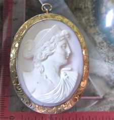 Edwardian/Victorian circa (1890-1910) well carved Coral stone Big marked solid 10K etched Yellow Gold brooch/pendant