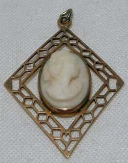 Edwardian Hand Carved Angel Skin cameo Circa 1915. Nice Diamond Shape Filigree Bezel.