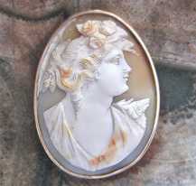 Greatly carved multicolored vintage shell, from the 1930th Unmarked/tested by the jeweler 14K Gold pendant (no bail).