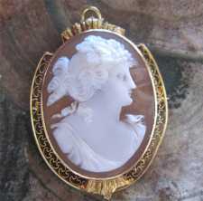 Well executed Victorian circa 1890-1910 signed by the Artist shell Hallmarked 10K Yellow Gold filigree Brooch/Pendant.