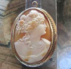 Huge greatly carved multicolored Antique shell, from the 1915-1930 Unmarked/tested by the jeweler 9K or 10K Gold brooch/pendant