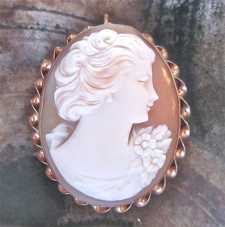 Superiorly carved shell image of young beauty from the 1930-1950, Hallmarked 10K Yellow Gold twisted rope Brooch/Pendant.