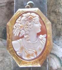 Masterly carved multicolored Carnelian shell Roman goddess circa 1890 Big octagonal 10K marked Yellow Gold etched brooch/pendant.