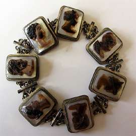 Dark on Light Mother Pearl carving, circa 1960th 835 marked Silver Bracelet. Roman God’s