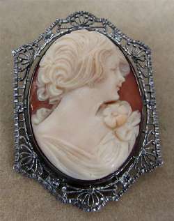 Pretty hand carved high profile cameo brooch