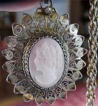 Nicely Framed Coral stone with Silver Art Deco filigree Star pendant & heavy 18” marked Sterling chain