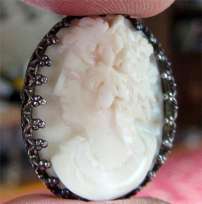 Nice carved Coral stone Cameo Beauty in Silver Bezel Brooch. Circa 1910