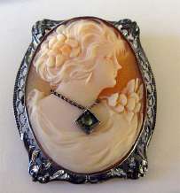 Quality late Art Deco Carnelian Shell Carving circa 1935 Filigree marked Sterling Brooch.