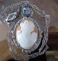 Nicely Framed Sterling Silver Art Deco Shell Pendent PNG Jewelers with 16” marked Sterling chain
