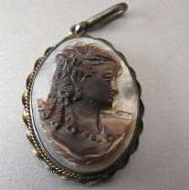 Nice nand carved dark on light Mother Pearl shell circa 1940th 800 Silver with patina Pendant
