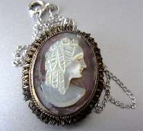 Nice nand carved light on dark Mother Pearl shell circa 1940th 800 Gold washed Silver Pendant & 18” sterling chain
