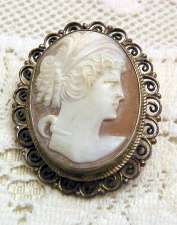 Fancy antique shell cameo lady silver curly frame pin pendant. Circa 1920