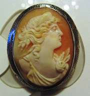 Roman style carved shell woman portrait from 1890th in the Silver Brooch