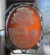 Hand carved Art Deco Shell image of girl from 1920th Unmarked Silver covered by Zinc Brooch