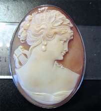 Superiorly Art Nouveau Carnelian Shell Carved Muse w/Lira Large Silver Brooch/Pendant.
