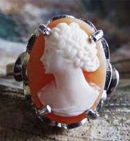 Ring size 10 Hand superiorly hand carved Carnelian shell Marked “925” Sterling Silver