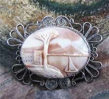 Hand carved Shell Vintage Cameo Pin Angel on Chariot Set in hallmarked Sterling Brooch with emerald(?) stones