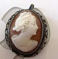 Superiorly carved Sardonyx shell image of girl circa 1925 Marked 800 fancy Silver Pendant. Easy turn to Brooch