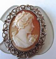First half of XX century hand carved shell in coin silver Pendant