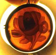 3-D quality Sardonyx Shell image of bouquet Pendant Marked 900 Sterling bezel with Gold rope