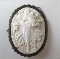 Edwardian image of dancing Venus & Cupped circa 1910 Rear carving bone in unmarked Silver Brooch