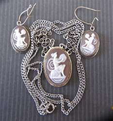 Sardonyx shell Cameo Pendant & Earrings Suite in unmarked silver. Tambourine player circa 1940 or earlier
