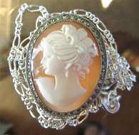 Pretty Italian hand carved shell in unmarked Silver marquisette pendant/brooch with 23” Sterling chain