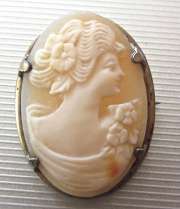 Circa 1910 Light hand carved shell Marked Vermeil Sterling Silver Brooch