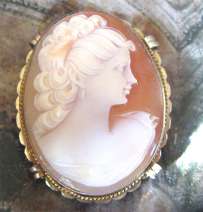 Signed by the Artist hand carved Carnelian shell circa 1940 Vermeil marked 925 Sterling Silver/Gold brooch/pendant