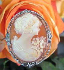 Superior Quality carved Carnelian shell embedded in filigree unmarked Silver Brooch circa 1920. Signed by the Artist.