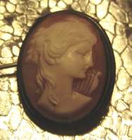 Circa 1915 Italian hand carved shell image of Muse Marked 800 with Gold rope darken Silver Brooch/Pendant