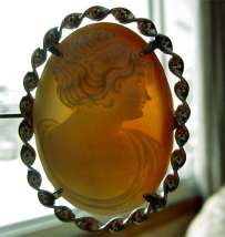 Beautifully hand carved young woman Carnelian shell Marked Sterling Silver twisted rope style brooch
