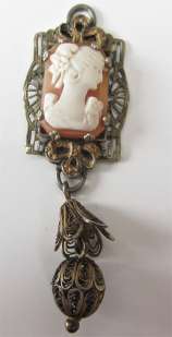 Circa 1915 Italian hand carved carnelian shell Unmarked with filigree drop Silver Pendant