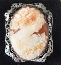 Museum Quality Art Nouveau style carved Carnelian shell circa 1920 in unmarked filigree Silver Brooch/Pendant.