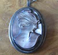 Hand carved dark Mother Pearl set circa 1920th Marked Coin Silver Pendant & Bracelet.
