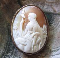 Well carved shell image of woman with spear (Joan of Arc?) unmarked vermeil Sterling Silver Brooch circa 1915.
