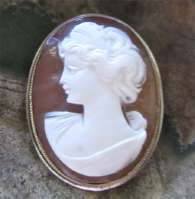 Circa 1920 Italian hand carved shell image of young girl Marked 800 with Gold rope Silver Brooch/Pendant