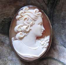 Superiorly hand carved Carnelian shell signed by the Artist Big Silver brooch circa 1930. from US Estate Action