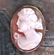 Petite hand carved light carnelian shell Gold washed Silver brooch Circa 1910