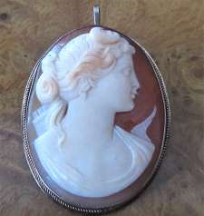 Masterly carved 3 colors Carnelian shell Goddess of Hunting Diana Marked 900 Italian vermeil Silver pendant/brooch circa 1915