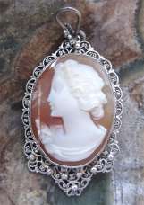 Great carving - shell (cracked) of young girl circa 1930-1950 Filigree Sterling Silver Pendant