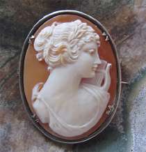 Unique quality carved Carnelian shell image of Muse Silver Italian brooch/pendant circa 1915.