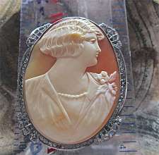 Edwardian or later Big Silver with Zinc Brooch, circa 1920. Well hand carved Conch shell. Signed by the Artist