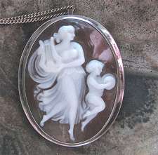 Museum Quality Carved Venus & Cupid playing harp & tambourine Shell in the Silver pendant/brooch with the chain circa 1935