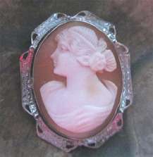 Beautiful Carnelian hand carved shell Goddess Diana. Signed & marked STERLING Silver etched filigree brooch circa 1920