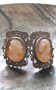 Amazingly carved little shells Cameo Vintage Earrings (clips) Marked 800 filigree Silver set. Circa 1925 -1935.