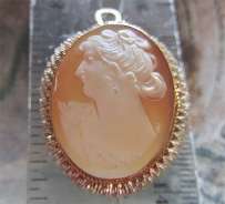 Well hand carved Conch shell woman profile. Circa 1930, Italy. Marked 800 Vermeil Silver pendant/brooch. Signed by the Artist.